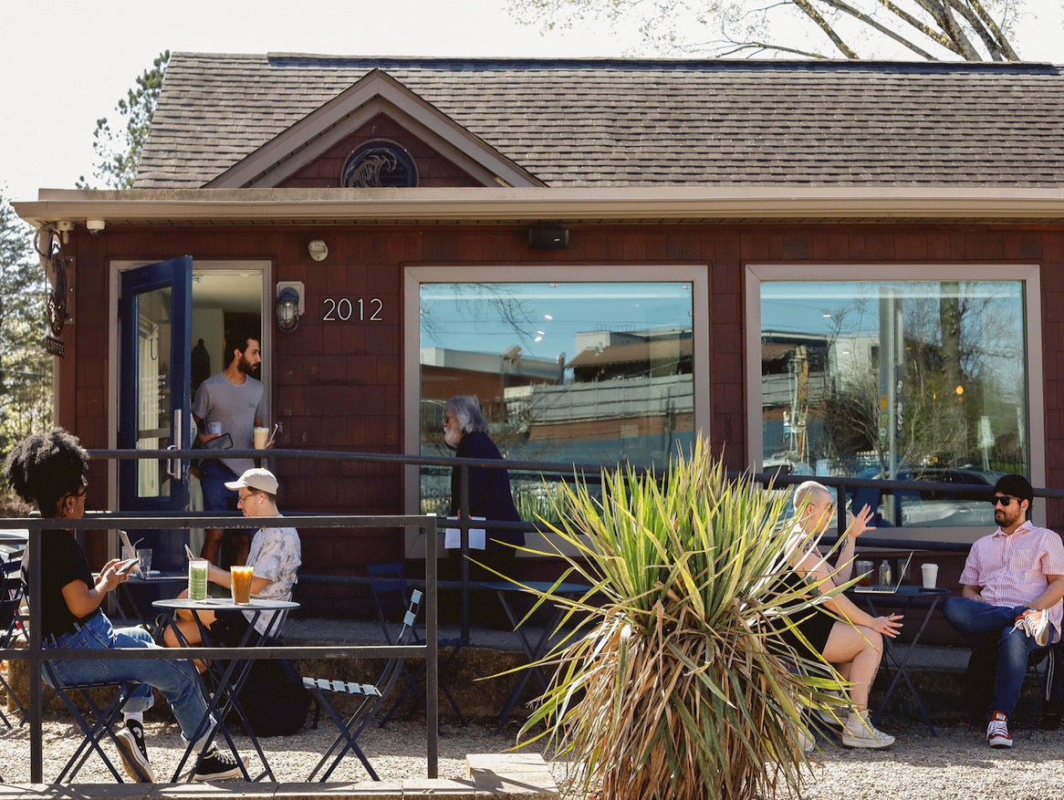 People enjoying coffee outside Under Current Coffee CLT
