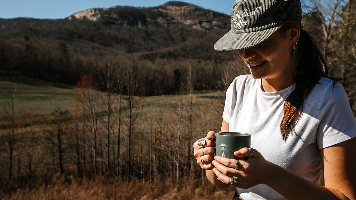 camper enjoying a cup of coffee