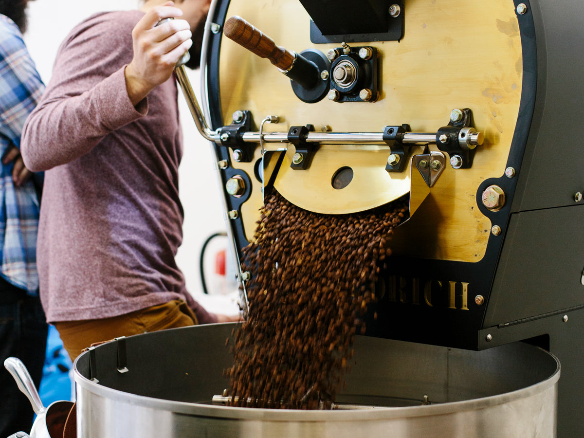 fresh coffee coming out of roaster