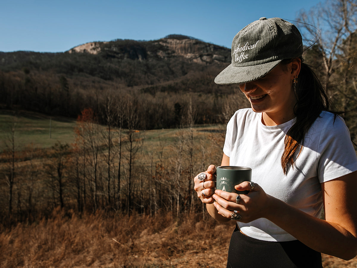 camper enjoying a cup of coffee