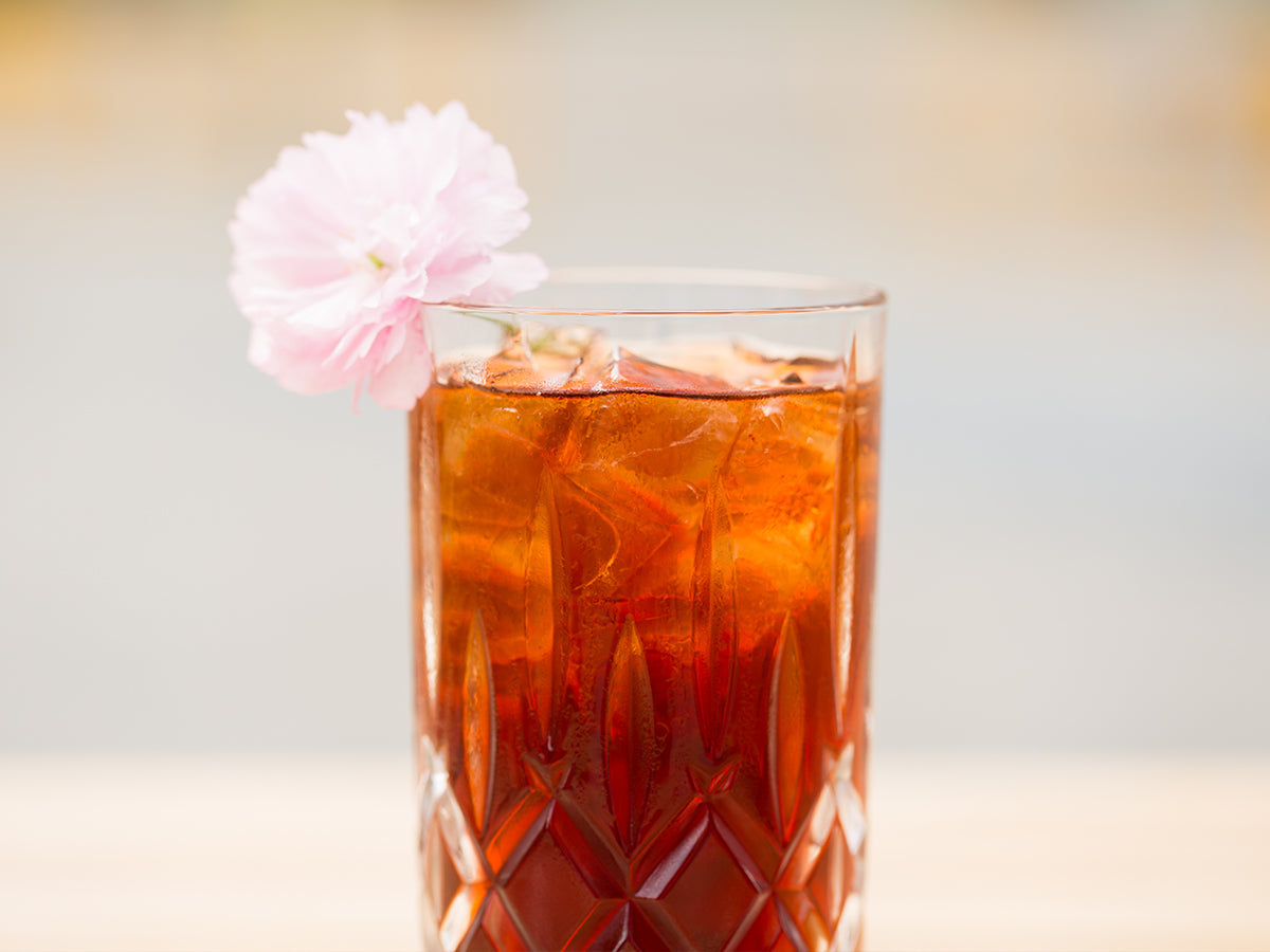 iced tea with a flower in glass